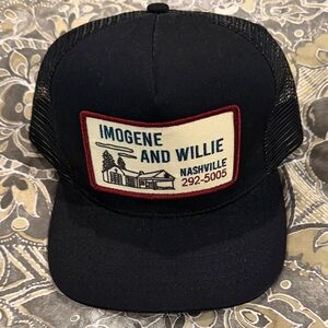 imogene + willie Black Trucker Hat with Red and White Patch